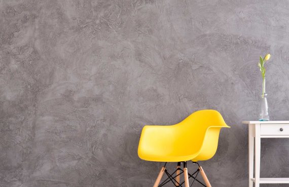yellow-chair-in-grey-wall-interior-PZED8LY